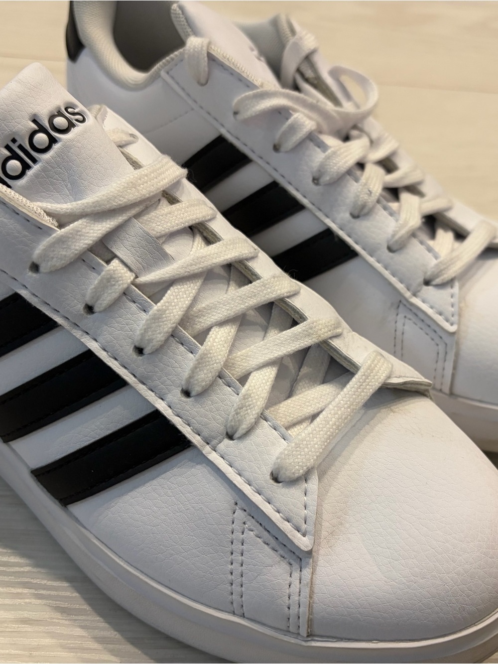 adidas Women's White Sneakers with Black Stripes